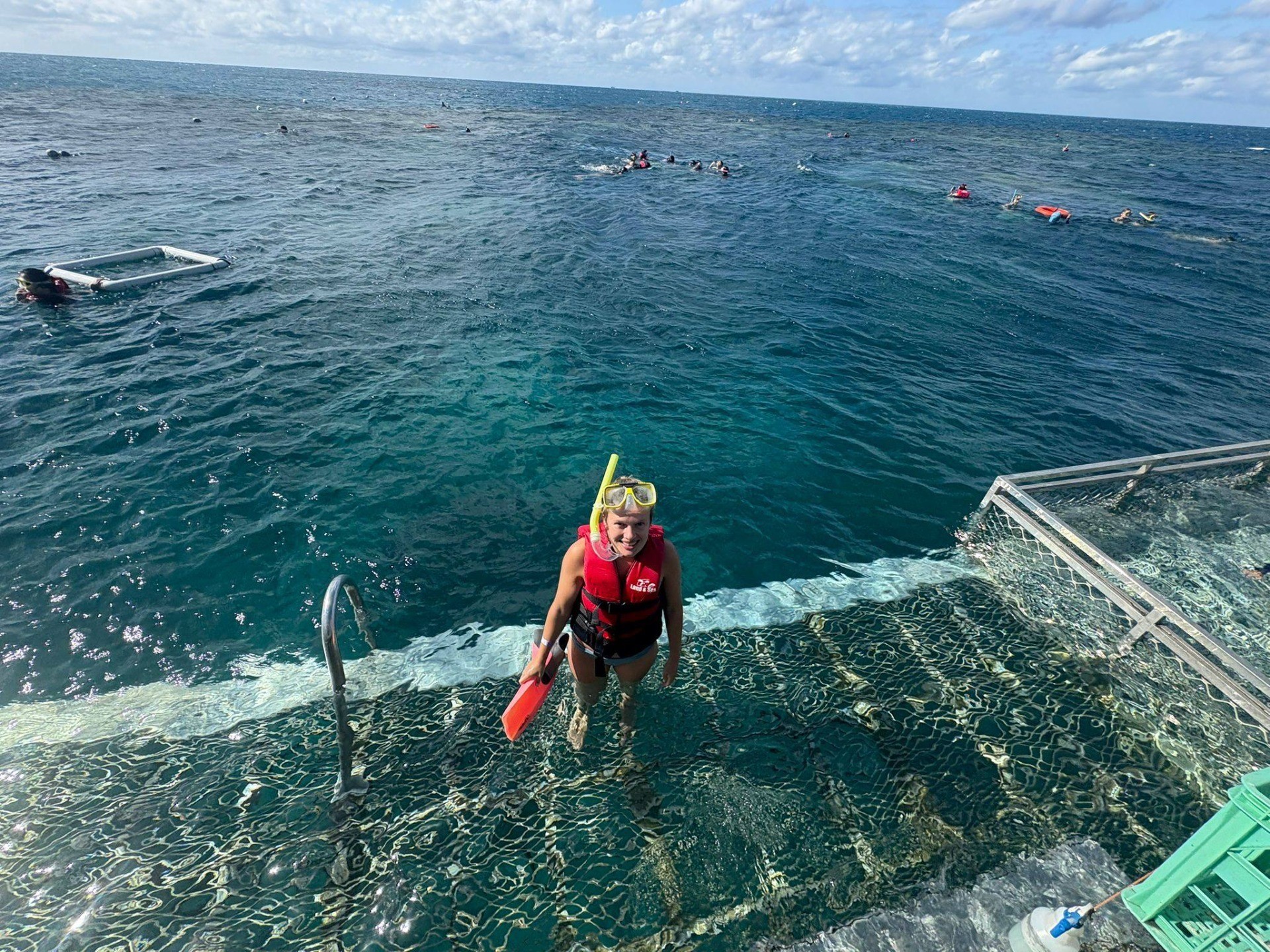 Torr wearing diving gear, coming out of the ocean