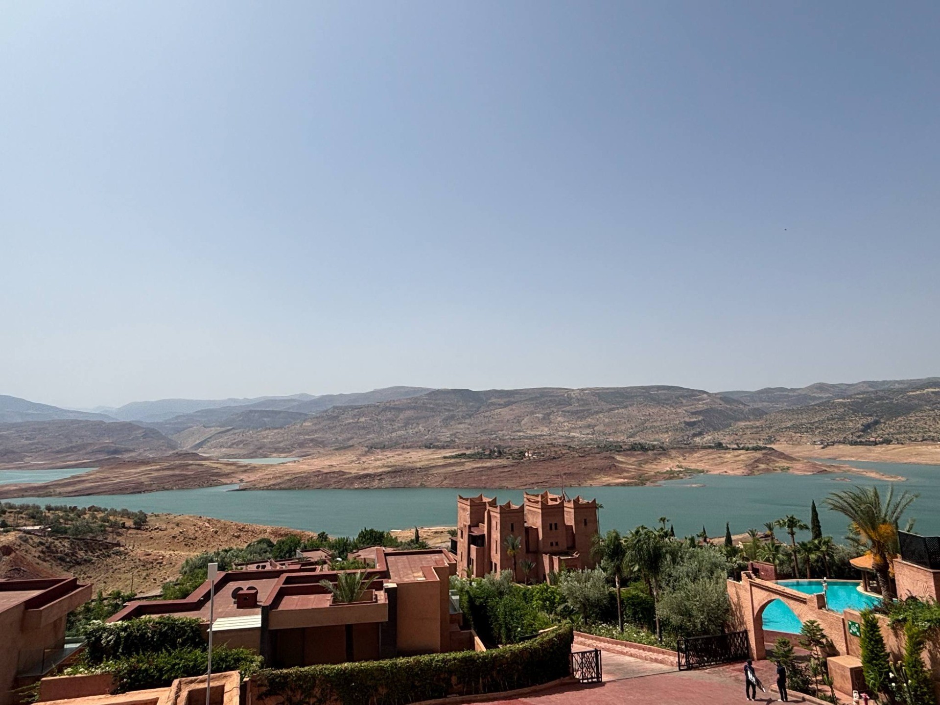 Overlooking the lake, hills and some buildings